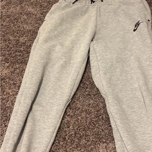 Grey Nike tech pants price can be lowered